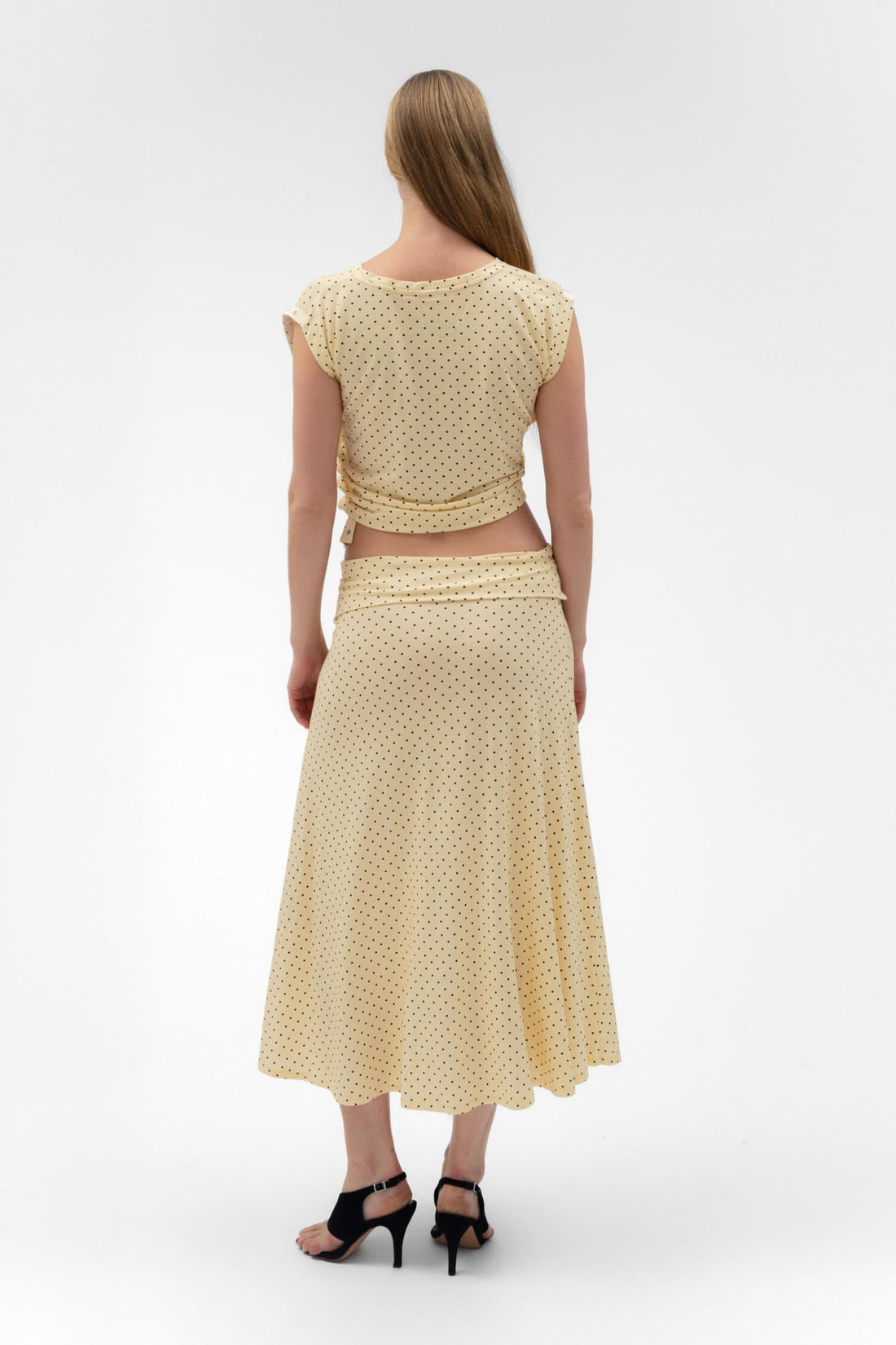 Findmenowthelabel foldover flared maxi skirt in butter color, featuring a midi length with a stylish, flowing design.
