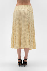 Foldover flared maxi skirt in buttery color by findmenowthelabel, featuring a flowy midi style with a high waist and soft fabric.