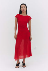Findmenowthelabel Valentina red maxi dress, flowing fabric and sleeveless design, shown on a model.