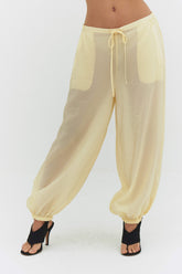 Findmenowthelabel Zora Voile Pant in butter color, lightweight and flowy fabric, relaxed fit, styled with casual accessories.
