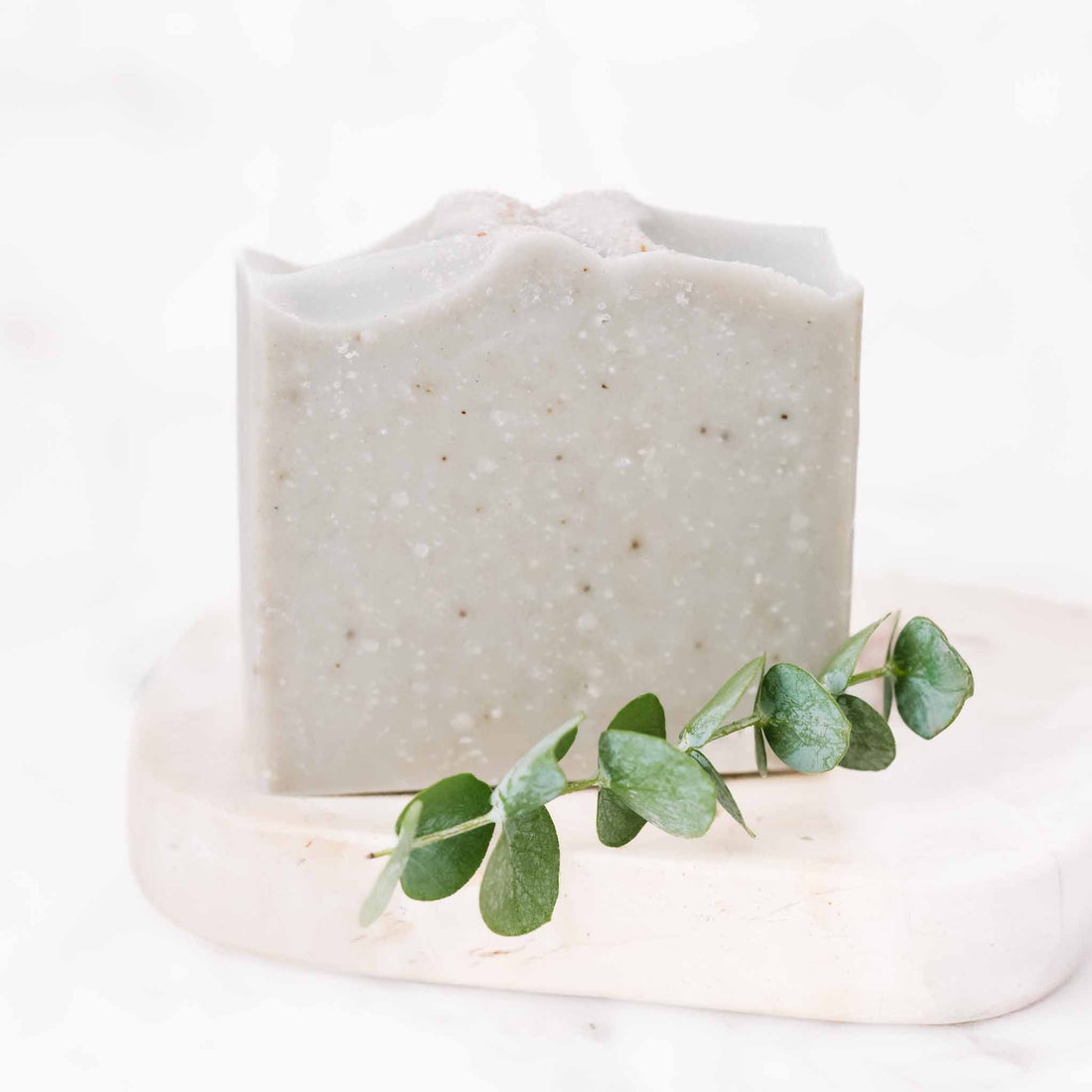 Handmade salt and sea tallow goat milk soap bar from Pretty Farm Girl with natural, textured surface and creamy lather.