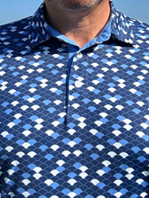 Close-up of White Water Life Scales Polo shirt fabric showing texture and stitching details.