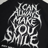 Black Always Smile T-shirt from Any Means Necessary Clothing featuring a close-up of the smile graphic on the front.