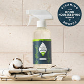 Puracy laundry stain remover bottle, 12 oz, with a clear label showing stain removal effectiveness and brand logo.