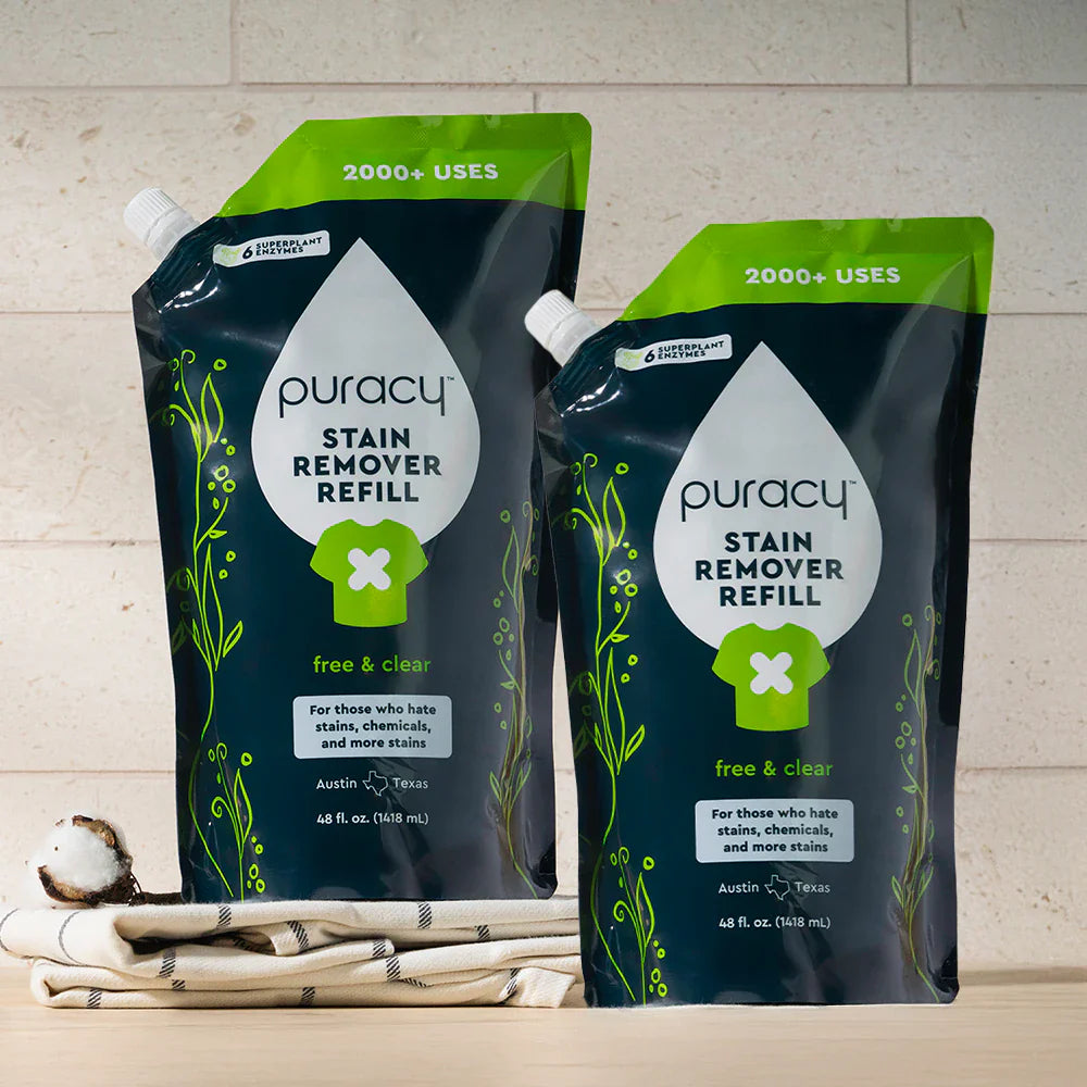 Puracy laundry stain remover in a 48oz two-pack, natural stain remover for clothes, showing bottles with cleaning solution.
