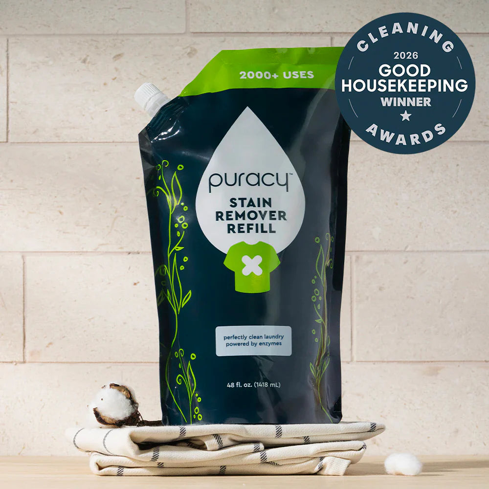 Puracy laundry stain remover in a 48oz bottle, effective for removing tough stains from clothing and fabrics.