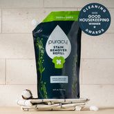 Puracy laundry stain remover in a 48oz bottle, effective for removing tough stains from clothing and fabrics.