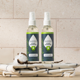 Puracy laundry stain remover in a 4oz bottle, two-pack, with clear liquid and label showing stain removal features.