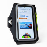 Shield Your Body arm band phone pouch for mobile phones, shown on a person&