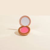YENSA Super Serum Silk Buildable Cream Blush in Pink Bliss, showing a smooth, creamy blush compact with a soft pink shade.