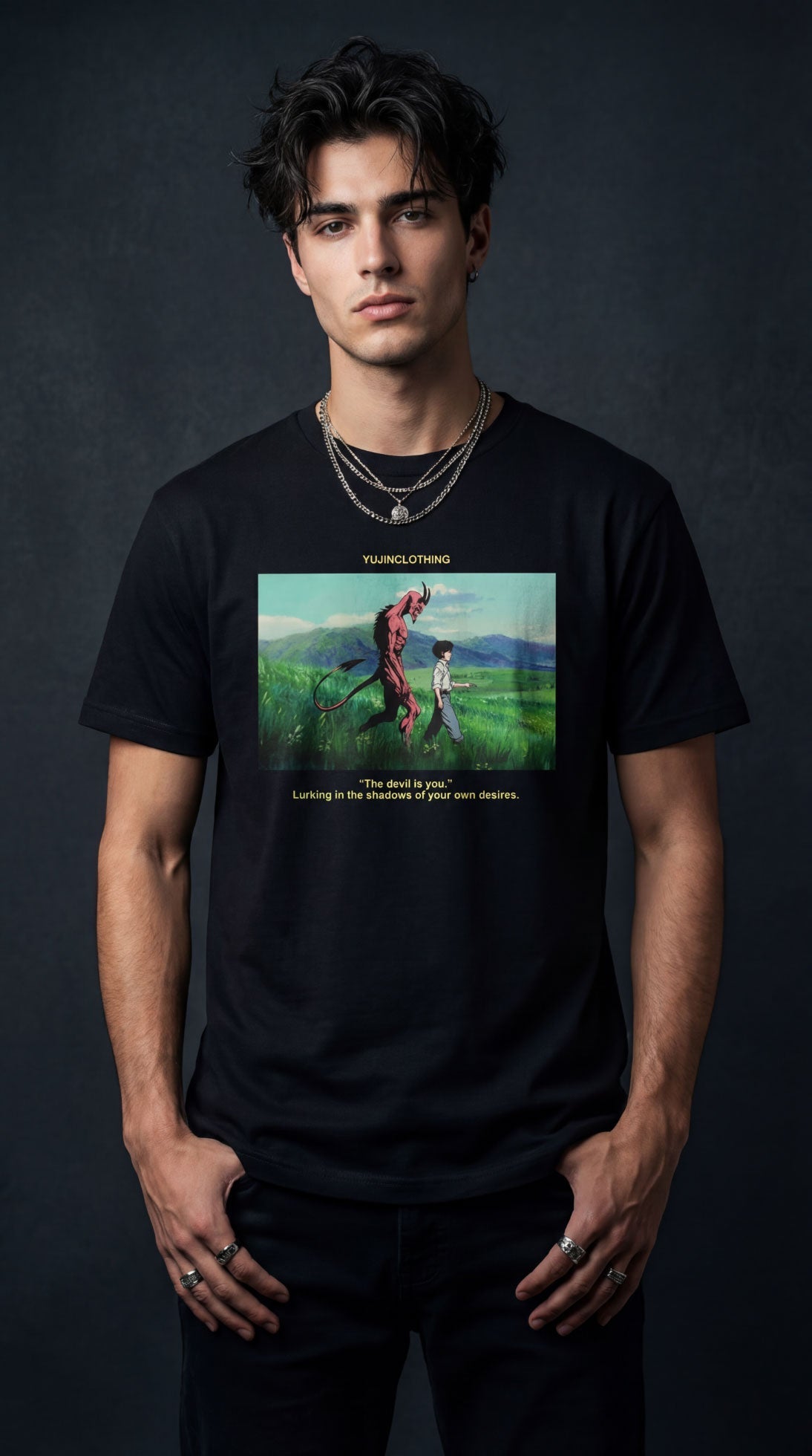 Yūjin Clothing Devil and Boy T-Shirt featuring a graphic print of a devil and a boy on black cotton fabric.