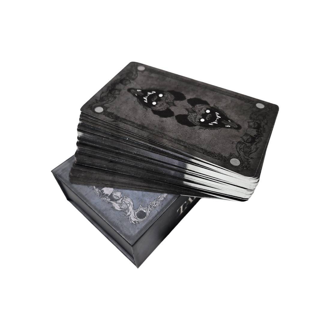 Image of a Tarot deck in a decorative box, featuring intricately designed tarot cards from the Any Means Necessary Clothing Tarot deck.