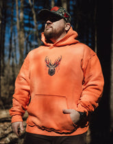 Orange Trophy Pullover Hoodie by Any Means Necessary Clothing, featuring a comfortable hoodie with a bold trophy graphic.