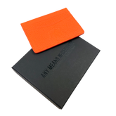 Orange Hyena Wallet lanyard from Any Means Necessary Clothing featuring a vibrant hyena design with wallet attachment.
