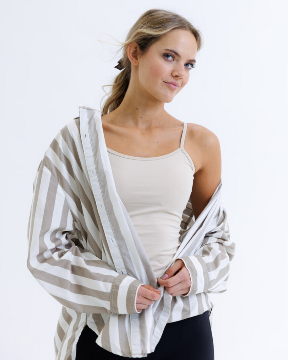Downeast Wonder Cami in nude color, a soft, fitted women’s tee with a scoop neckline and sleeveless design.