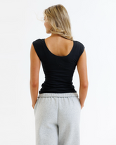 Gray Downeast Wonder Tee featuring a relaxed fit and soft fabric, displayed on a hanger.