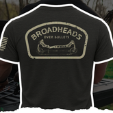 Black Bow Crew Apparel "Broadheads Over Bullets" T-shirt featuring bold graphic design for bow hunting enthusiasts.