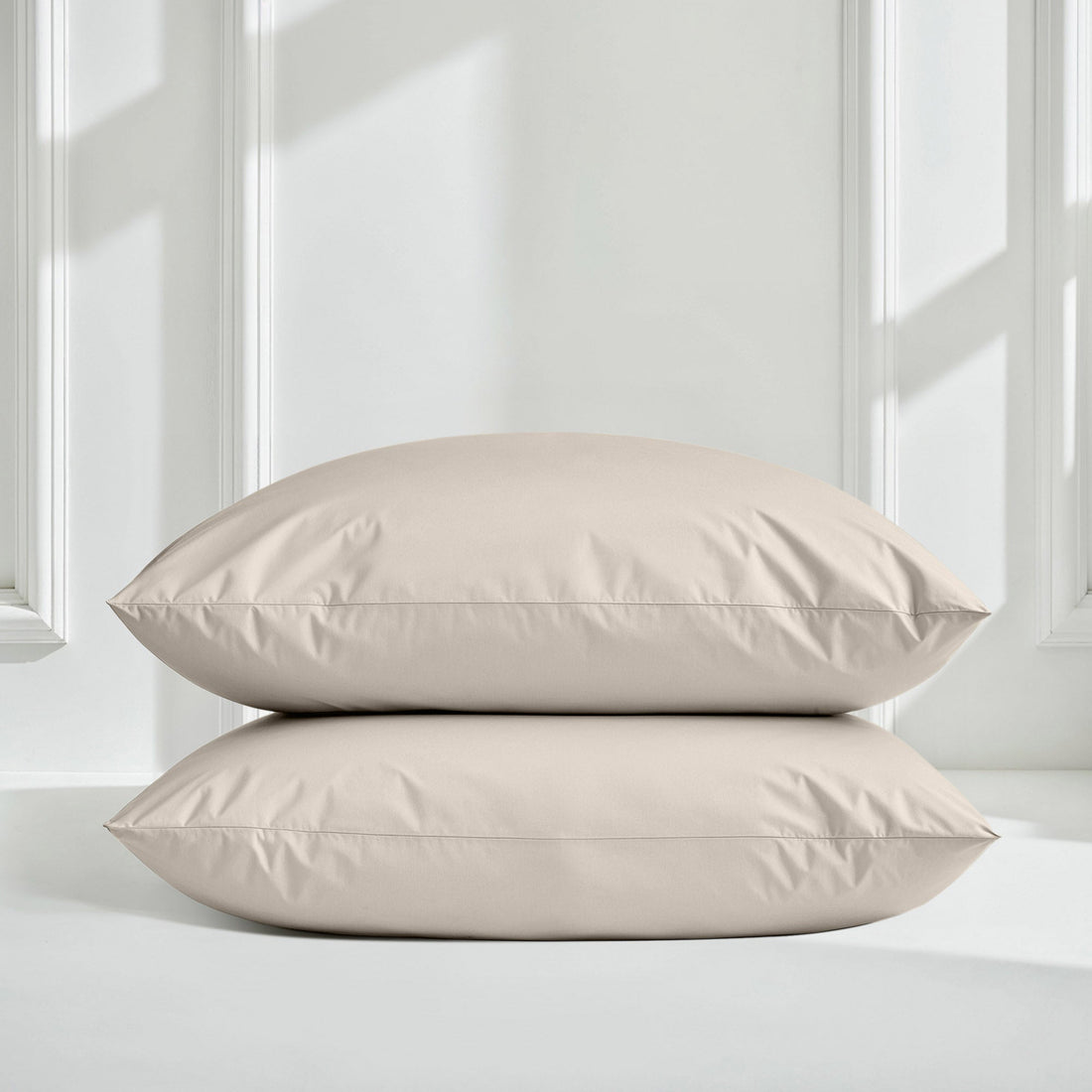 Italic Luxe Australian Sateen Pillowcase Set featuring smooth, silky bed pillowcases in a neutral color for a luxurious bedroom look.