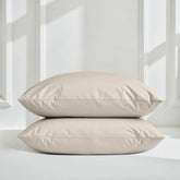 Italic Luxe Australian Sateen Pillowcase Set featuring smooth, silky bed pillowcases in a neutral color for a luxurious bedroom look.