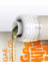Bottle of Algae Cooking Oil from Algae Cooking Club, showcasing clear oil in a plastic container with a label on a white background.