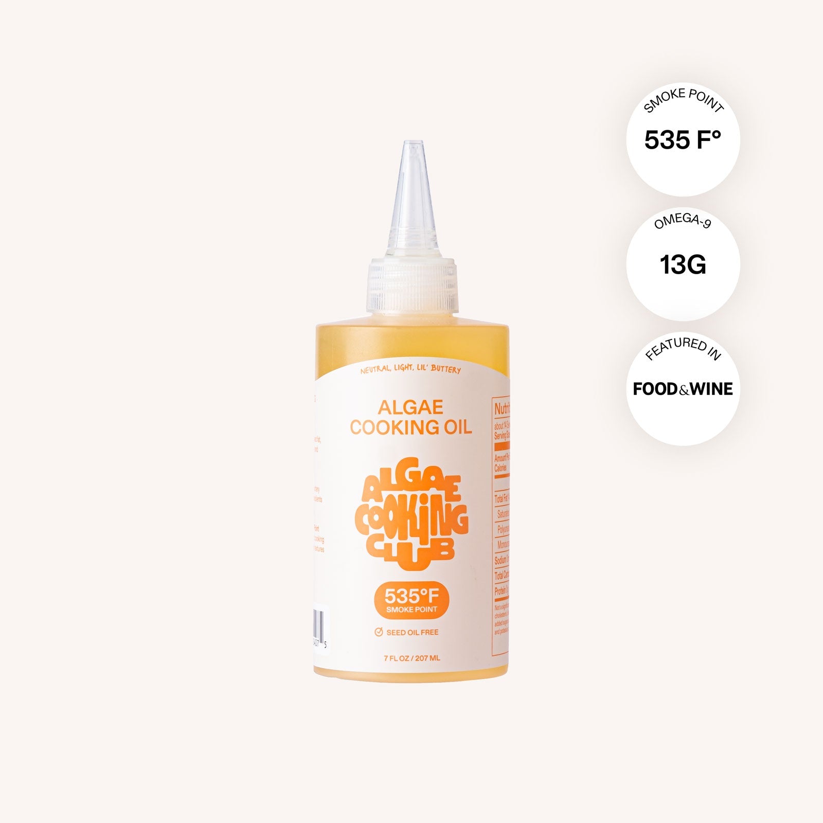 Chef-grade Algae Cooking Oil in a 7 fl oz bottle from Algae Cooking Club, with a clear view of the oil and bottle label.