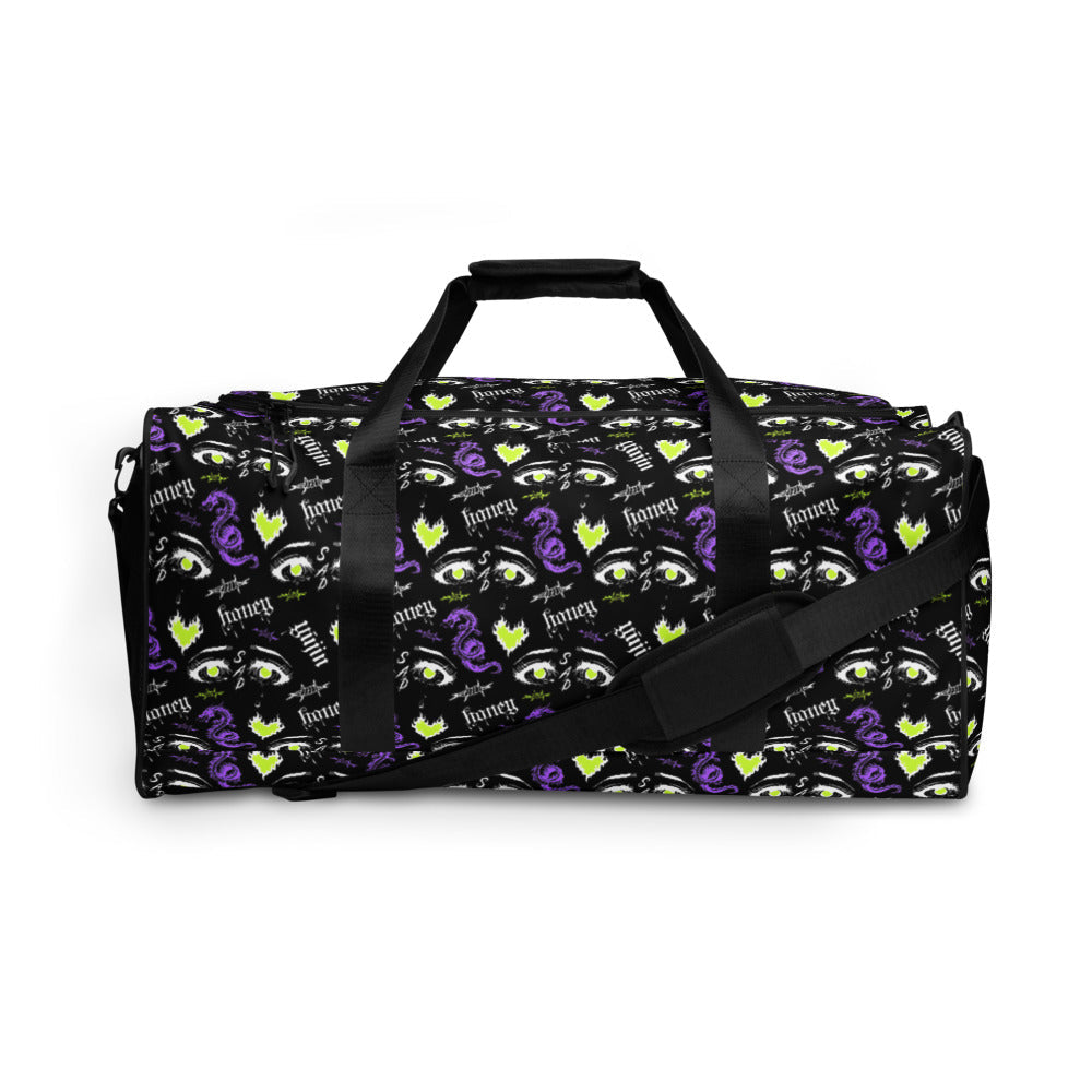 Yūjin Clothing Honey Duffle Bag featuring a spacious design, durable fabric, and stylish honey-colored exterior.