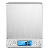 August Uncommon Tea precision scale for teaware, showing a close-up of the digital display and weighing tea leaves accurately.