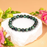 Seraphinite bracelet by Conscious Items featuring a rare angel energy stone for transformation and spiritual healing.