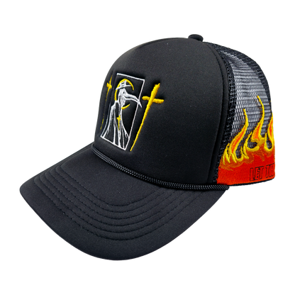 Trucker hat from Any Means Necessary Clothing featuring "Let the Weak Burn" slogan on front, black mesh back, and structured brim