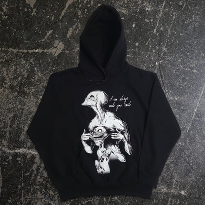 Black Always Smile Pullover Hoodie by Any Means Necessary Clothing, front view showing the smile graphic on the hoodie.