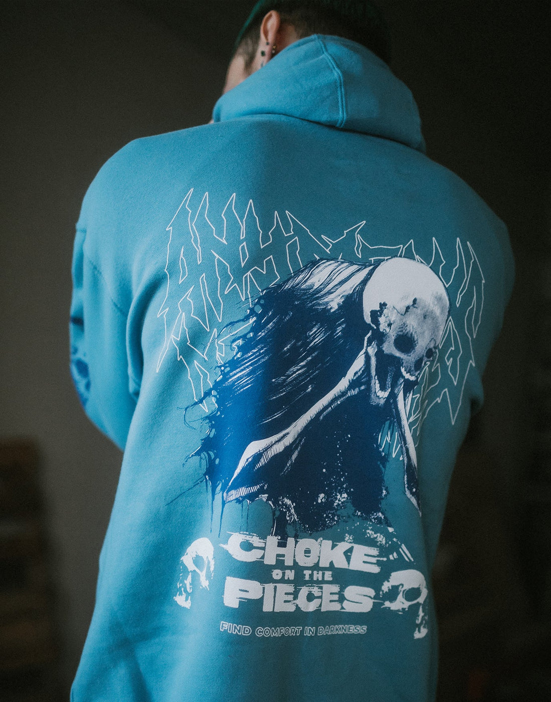 Black Any Means Necessary Clothing Choke Pullover Hoodie with front pocket and drawstring hood, casual streetwear style.