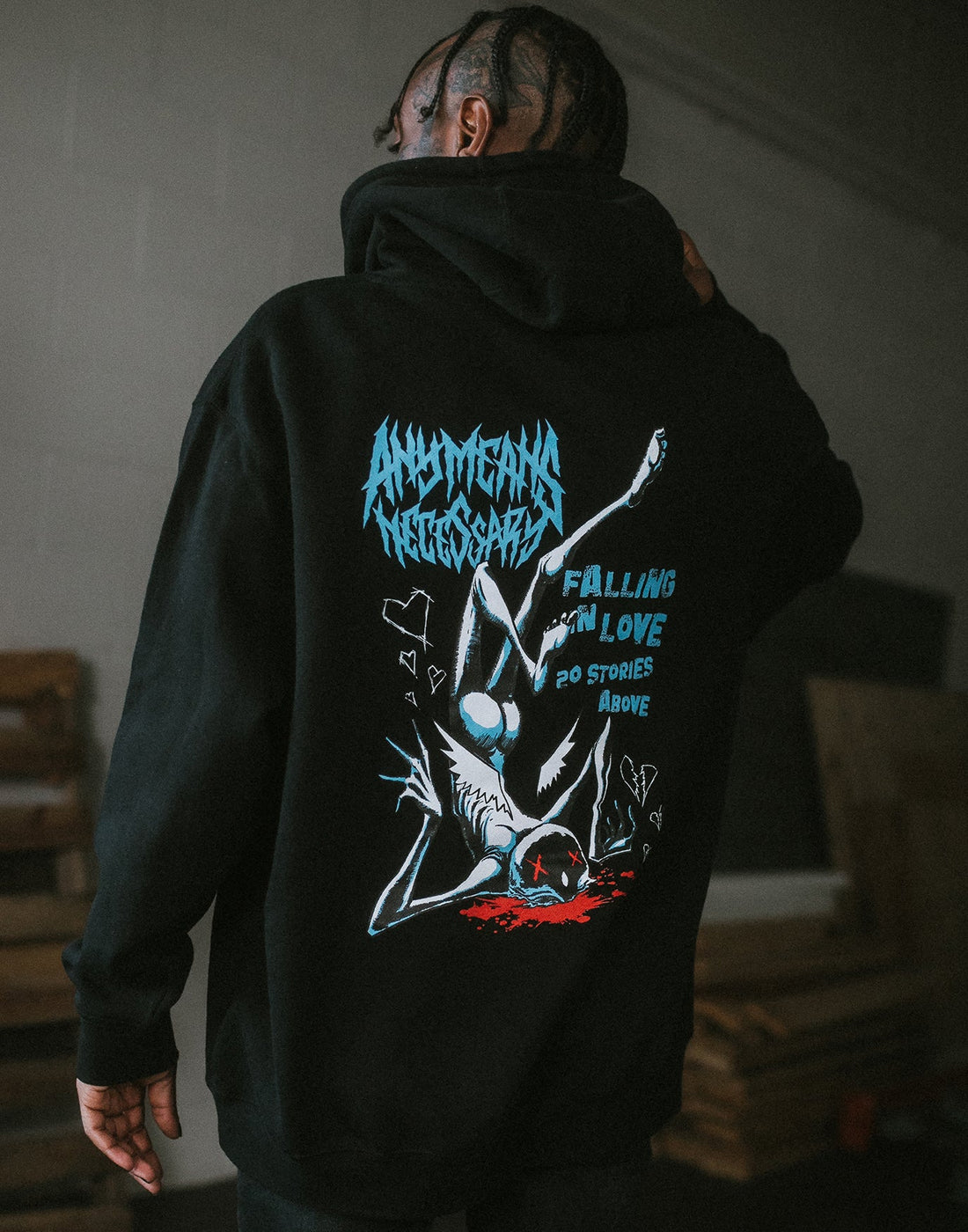 Black Falling in Love hoodie by Any Means Necessary Clothing, featuring a cozy pullover design and stylish fit.