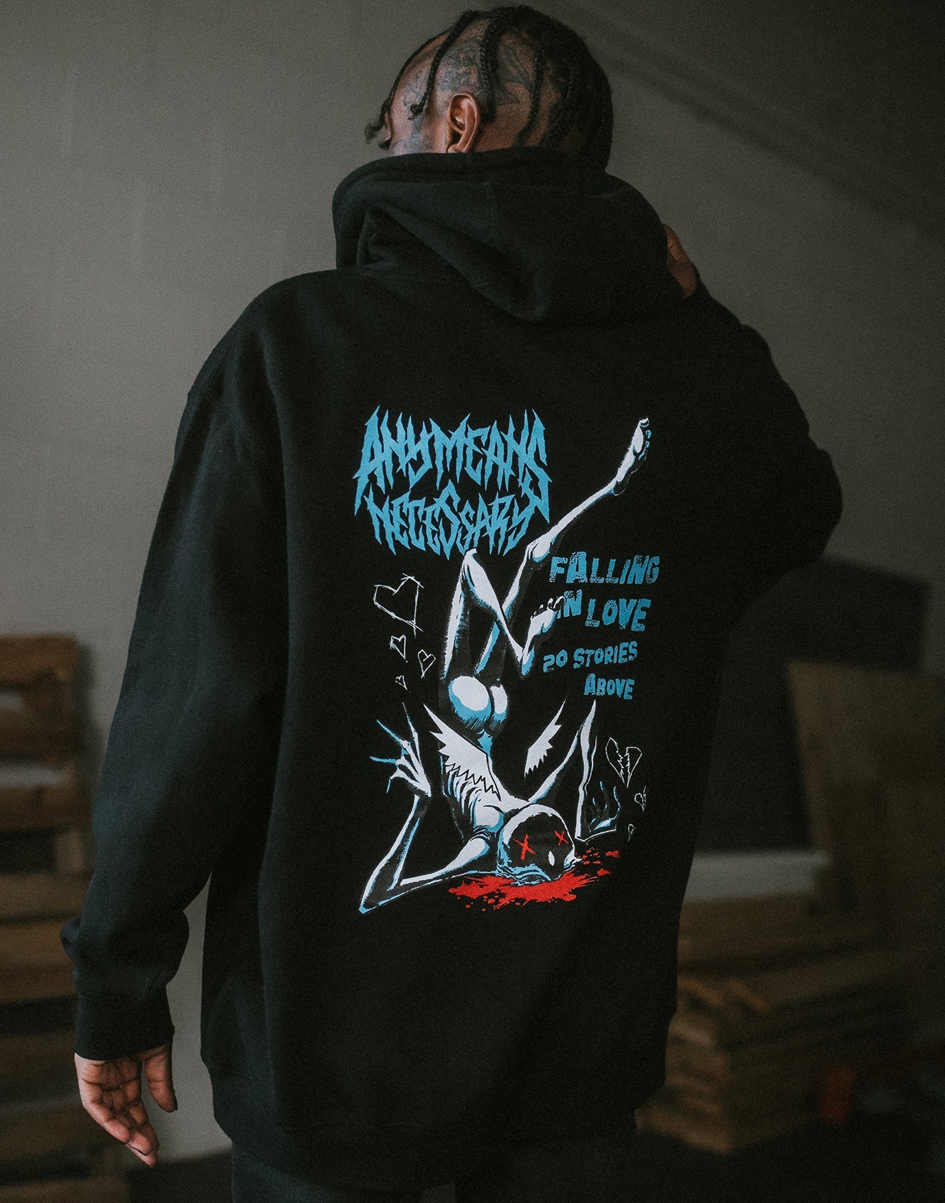 Black Falling in Love hoodie by Any Means Necessary Clothing, featuring a cozy pullover design and stylish fit.