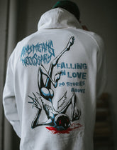 Vintage white Falling in Love hoodie by Any Means Necessary Clothing, featuring a comfortable pullover design and casual style.