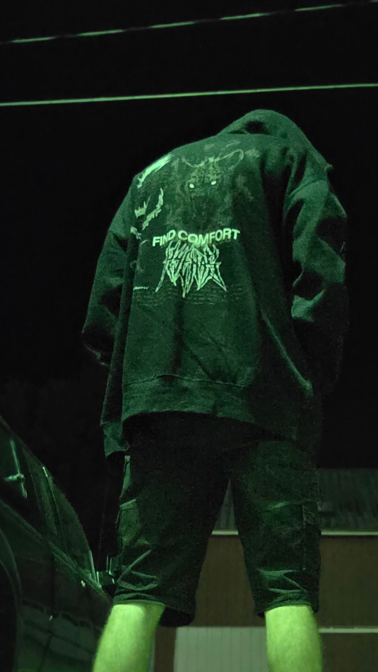 Black Mantra Pullover Hoodie by Any Means Necessary Clothing showing front view with hood and logo design.