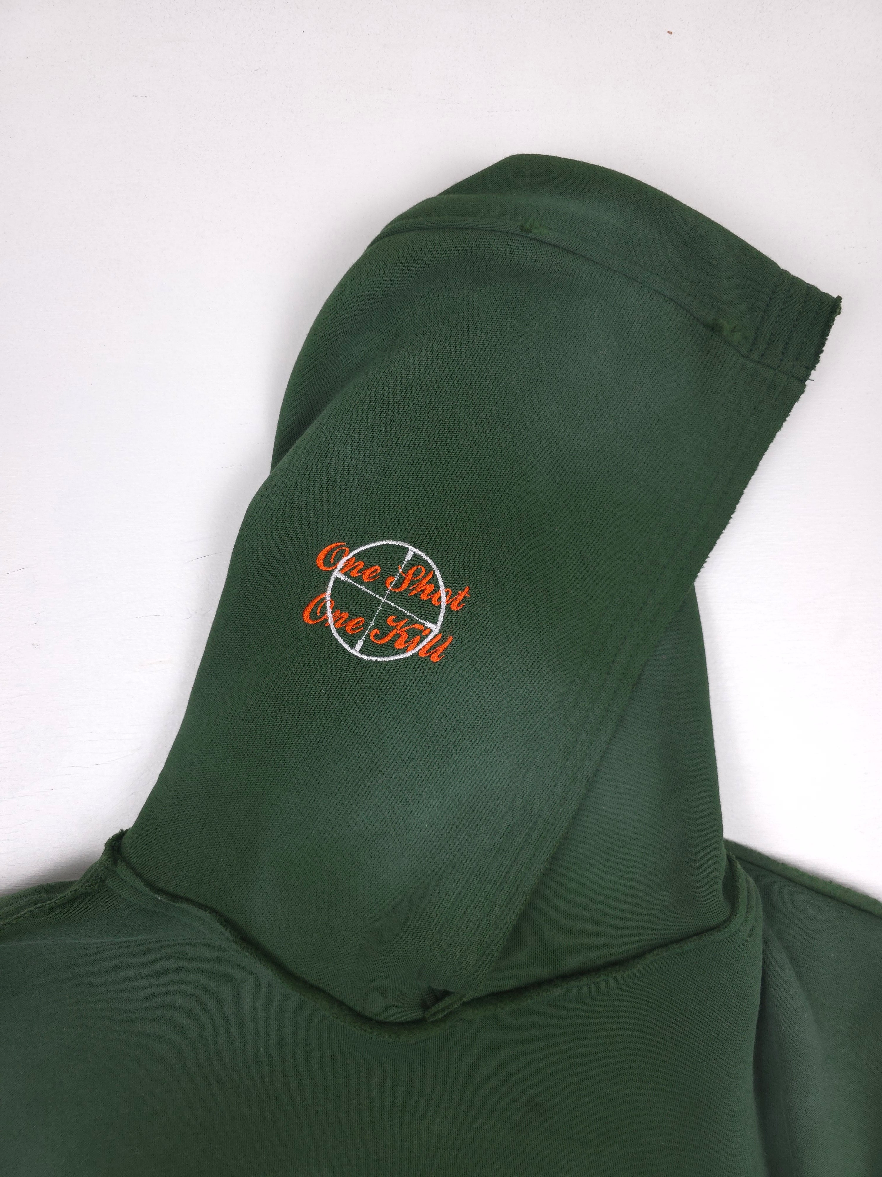 Green Trophy Pullover Hoodie by Any Means Necessary Clothing, featuring a front design and comfortable fit.