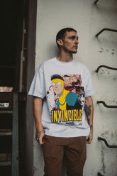 White Betrayal T-Shirt from Any Means Necessary Clothing, featuring a casual shirt style with graphic design on the front.