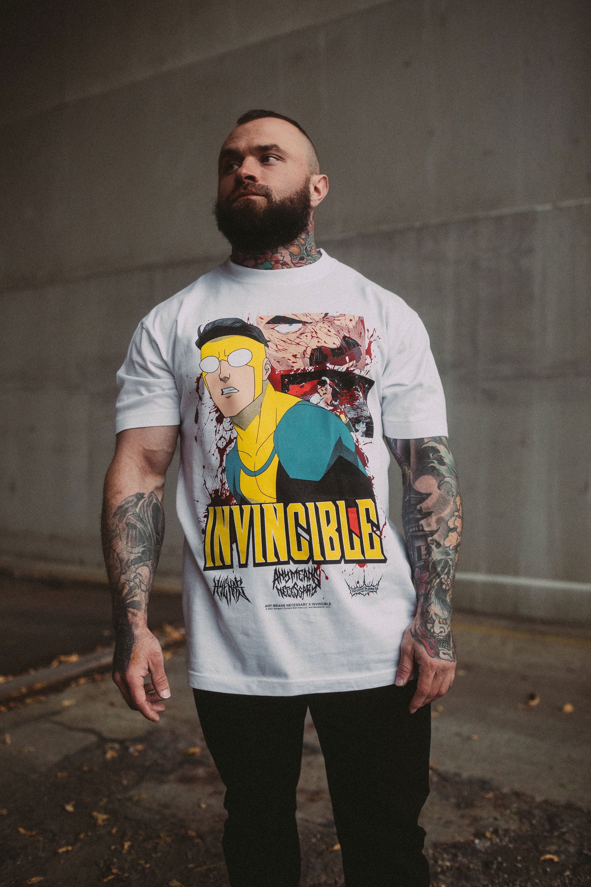 White Betrayal T-Shirt from Any Means Necessary Clothing, featuring a casual shirt design with graphic print.