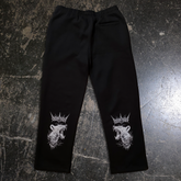 Back view of Any Means Necessary Clothing Mantra Sweatpants, comfortable casual sweatpants with a relaxed fit and drawstring waist.
