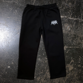 Front view of Any Means Necessary Clothing Mantra sweatpants showing their relaxed fit and comfortable design