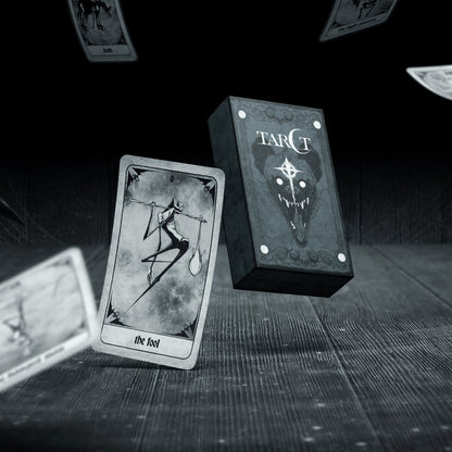 Set of Tarot Cards from Any Means Necessary Clothing featuring a colorful, artistic tarot deck spread out for reading or display.