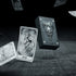 Set of Tarot Cards from Any Means Necessary Clothing featuring a colorful, artistic tarot deck spread out for reading or display.