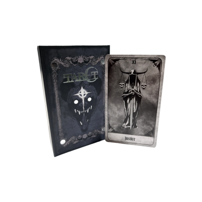A set of tarot cards in a decorative box, featuring intricate designs and artwork from the Any Means Necessary Clothing tarot deck.