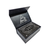 Image of a Tarot Deck in a decorative box, featuring colorful tarot cards from the Any Means Necessary Clothing Tarot Cards set.