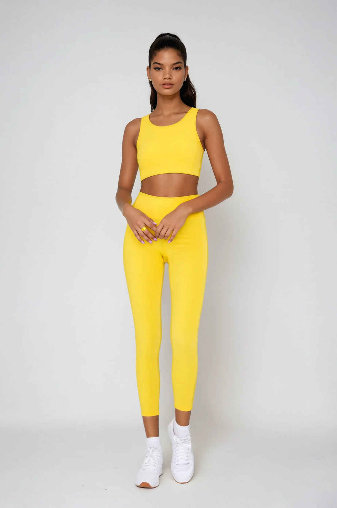 Yellow Breathe Easy cut-out back sports bra by Fitkitty Culture, made of Lycra® blend, suitable for yoga and active wear.