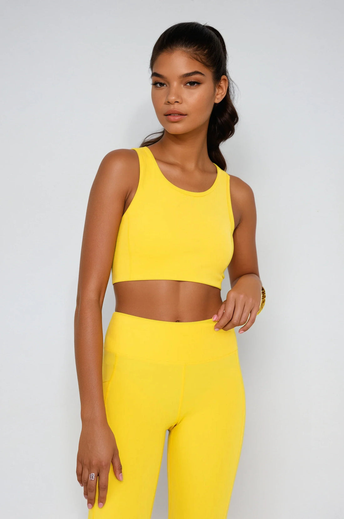 Yellow Breathe Easy Cut-Out Back Sports Bra by Fitkitty Culture, made of Lycra® blend, featuring a stylish back cut-out design.