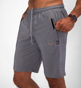 Grey SCR Sportswear Urban Stride all-day wear shorts with 11-inch inseam and zipper pockets, designed for athletic comfort.