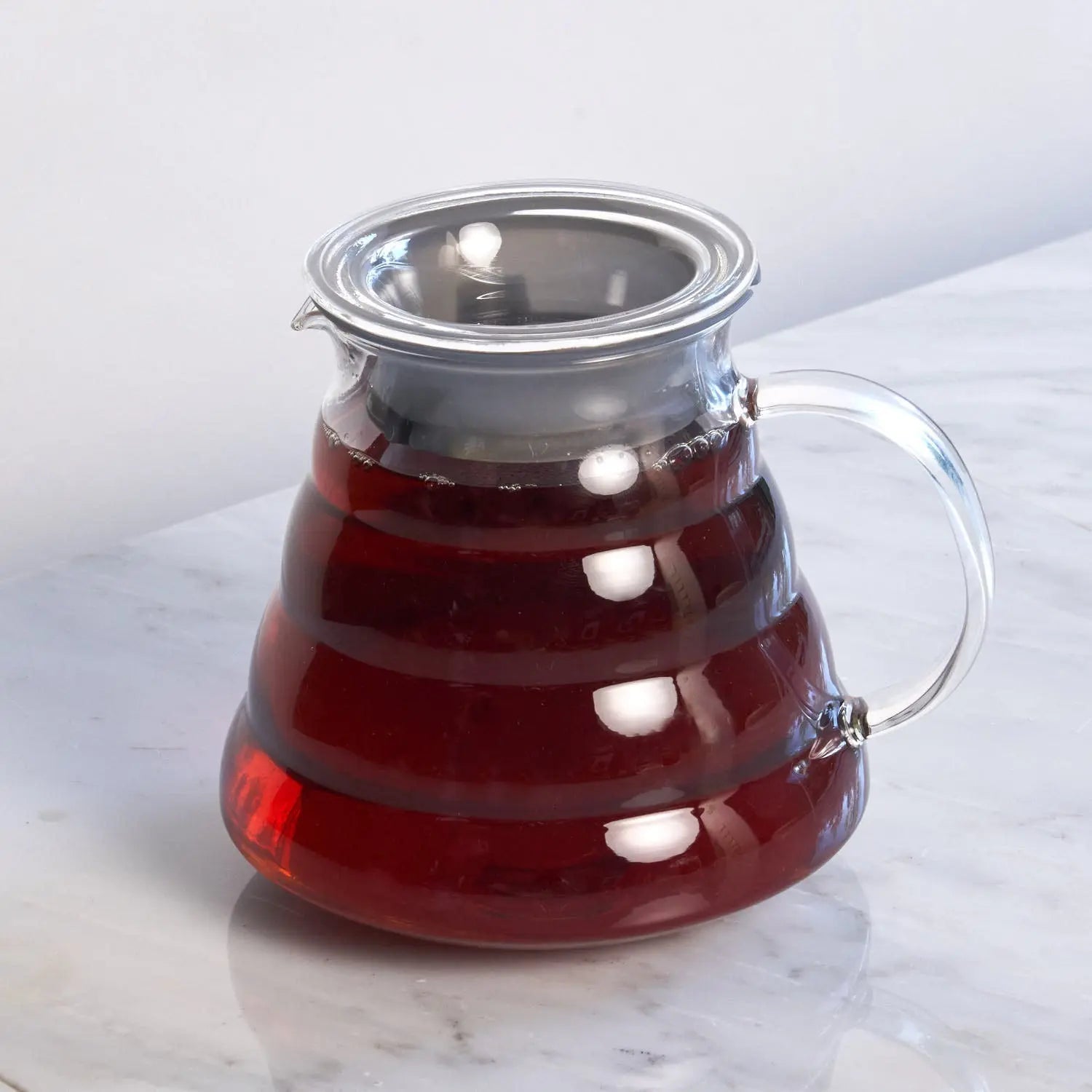 August Uncommon Tea Tea for Two starter set with glass teaware, including teapot and cups, for brewing and serving tea.