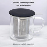 August Uncommon Tea One Cup Infuser in a mug with lid, easy-to-use tea infuser for brewing loose leaf tea.