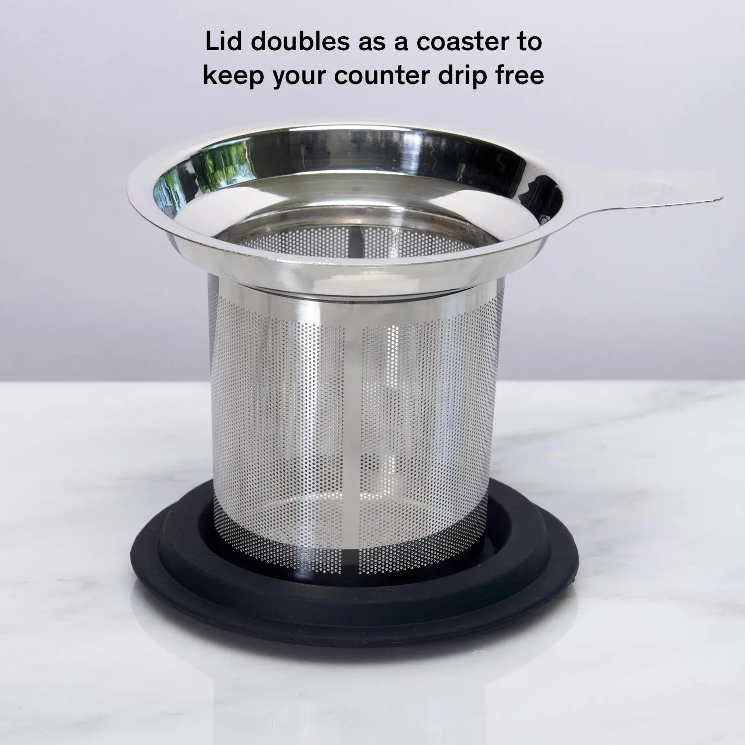 August Uncommon Tea One Cup Infuser on lid, innovative tea infuser for brewing loose leaf tea easily and efficiently.